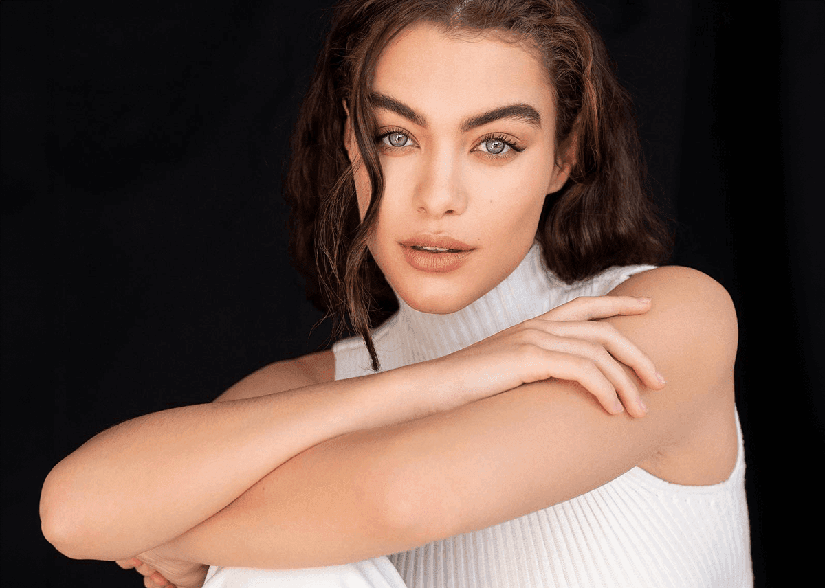 Girl with Wet Hair Radiant Glow Makeup Posing
