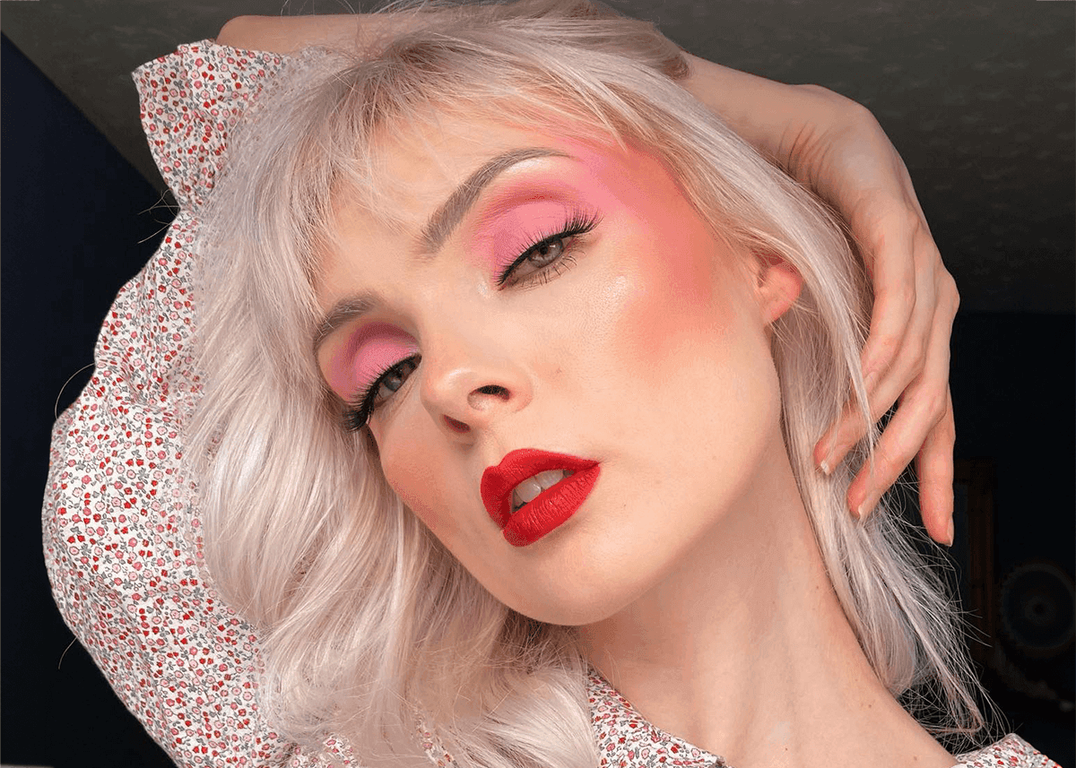 Classic red lip modern twist Strawberry pink eye