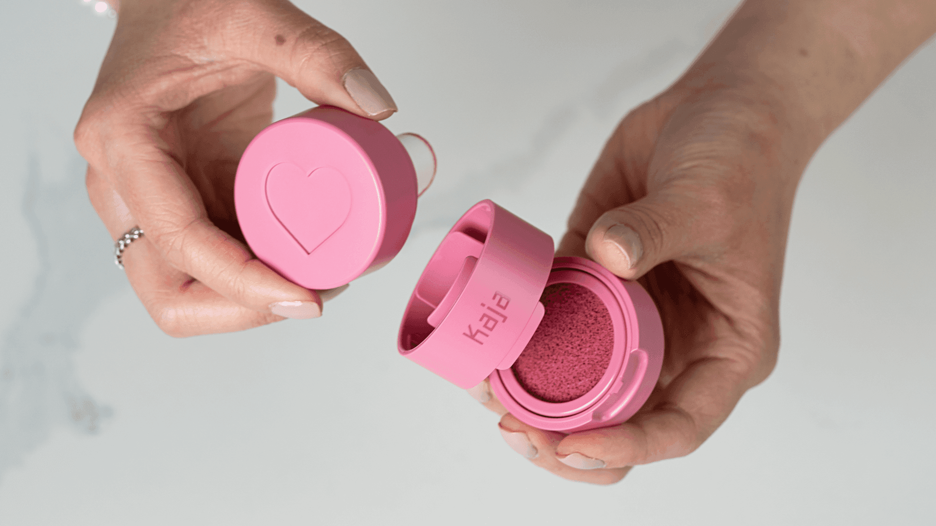 Kaja Cheek Stamp Held in Hand