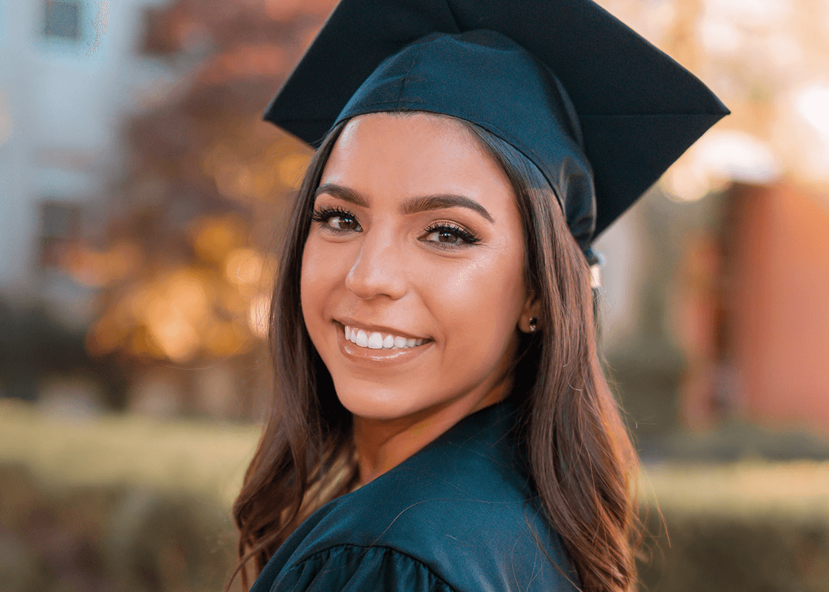 Young Girl Smiling Graduation Makeup