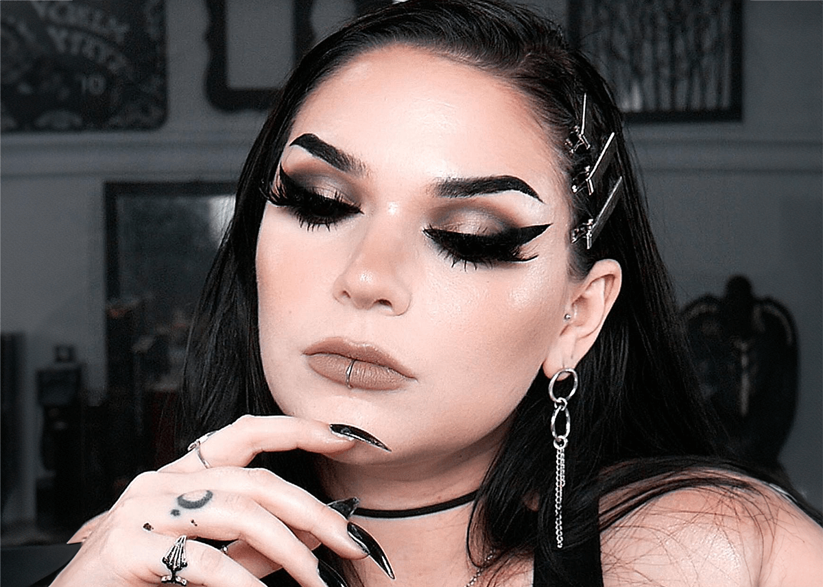 A woman with goth makeup inspirations from pop culture