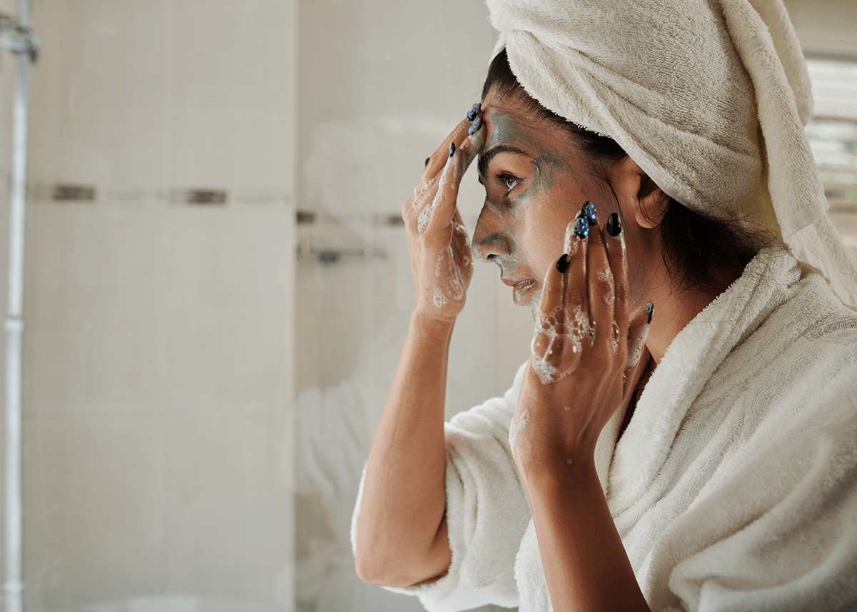 Girl washing and prepping face